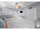 Comfortable bedroom with a bunk bed, queen bed, and coastal-themed bedding at 1058 Sea Mountain Hwy. # 14-302, North Myrtle Beach, SC 29582