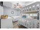 Bright bedroom featuring two beds, a bunk bed, and coastal-themed decor at 1058 Sea Mountain Hwy. # 14-302, North Myrtle Beach, SC 29582