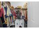 Walk-in closet with ample storage space, hanging rods, and shelving for organization at 1058 Sea Mountain Hwy. # 14-302, North Myrtle Beach, SC 29582