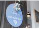 A charming front door sign that reads 