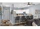 Charming kitchen featuring white cabinetry, bar seating, and modern appliances at 1058 Sea Mountain Hwy. # 14-302, North Myrtle Beach, SC 29582