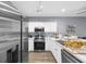 Well-equipped kitchen with stainless steel appliances and ample counter space at 1058 Sea Mountain Hwy. # 14-302, North Myrtle Beach, SC 29582