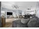 Spacious living room with cozy seating, a large TV, and an open layout to kitchen at 1058 Sea Mountain Hwy. # 14-302, North Myrtle Beach, SC 29582