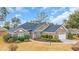 Beautiful single story home with well-manicured landscaping and an attached two car garage at 1107 Swan Lake Dr., North Myrtle Beach, SC 29582