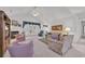 Large living room featuring a fireplace, French doors, and comfortable seating arrangements at 1107 Swan Lake Dr., North Myrtle Beach, SC 29582