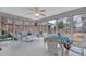 Bright sunroom featuring lots of windows for natural light and wicker furniture for relaxation at 1107 Swan Lake Dr., North Myrtle Beach, SC 29582