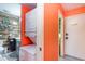 Laundry area featuring stacked washer/dryer and coastal themed bathroom nearby at 123 Dogwood Dr. N # 205-A, Murrells Inlet, SC 29576