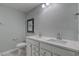 Bathroom with a double vanity, neutral paint and modern fixtures at 1275 Winding Creek Way, Myrtle Beach, SC 29588