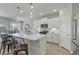 Bright and airy kitchen with a spacious island, pendant lighting, and stainless steel appliances at 1275 Winding Creek Way, Myrtle Beach, SC 29588