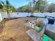 Well-manicured backyard with paver stone patio, lawn and privacy fence at 152 Rose Water Loop, Myrtle Beach, SC 29588