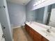 Bathroom featuring double sink vanity, tile floors, and a combined tub and shower at 152 Rose Water Loop, Myrtle Beach, SC 29588
