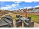 Backyard with a patio, a lake view, and outdoor seating and furniture at 1547 Harlow Ct., Myrtle Beach, SC 29579