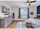 Primary bedroom featuring a ceiling fan, nice furniture, and a bright window at 1547 Harlow Ct., Myrtle Beach, SC 29579