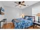 Bedroom with a bed, wood floors, window with blinds, and overhead ceiling fan at 1547 Harlow Ct., Myrtle Beach, SC 29579