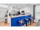 A modern kitchen featuring a breakfast bar, white cabinets, and stainless steel appliances at 1547 Harlow Ct., Myrtle Beach, SC 29579