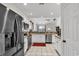 Modern kitchen with stainless steel appliances, white cabinets, and tile flooring at 1547 Harlow Ct., Myrtle Beach, SC 29579