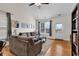 Comfortable living room with hardwood floors, a vaulted ceiling, and plenty of natural light at 1547 Harlow Ct., Myrtle Beach, SC 29579