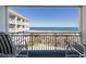 Balcony seating with unobstructed views of the beach and ocean at 1581 South Waccamaw Dr. # 304, Garden City Beach, SC 29576