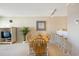 Inviting dining room with a wooden table, six chairs, and a bar area, perfect for entertaining at 1581 South Waccamaw Dr. # 304, Garden City Beach, SC 29576
