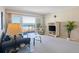 Inviting living space with a TV and balcony offering ocean vistas at 1581 South Waccamaw Dr. # 304, Garden City Beach, SC 29576