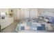 Comfortable bedroom with a white dresser, providing ample storage, and two closets at 1581 South Waccamaw Dr. # 304, Garden City Beach, SC 29576