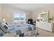 Serene main bedroom with balcony access, providing stunning ocean views and natural light at 1581 South Waccamaw Dr. # 304, Garden City Beach, SC 29576