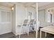 Welcoming porch with outdoor seating and view of neighborhood at 1581 South Waccamaw Dr. # 304, Garden City Beach, SC 29576