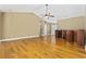Large living room with hardwood floors, vaulted ceilings, and neutral-toned walls at 197 Black Bear Rd., Myrtle Beach, SC 29588