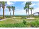 Scenic beach access with palm trees, dunes, and ocean view at 205 74Th Ave. N # 1508, Myrtle Beach, SC 29572