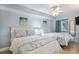 This bedroom features two beds, light blue walls, stylish bedding, and a ceiling fan for added comfort at 205 74Th Ave. N # 1508, Myrtle Beach, SC 29572
