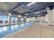 Bright indoor pool area with lounge seating and ocean view at 205 74Th Ave. N # 1508, Myrtle Beach, SC 29572