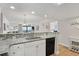 Bright kitchen with stainless steel appliances, granite counters, and breakfast bar at 205 74Th Ave. N # 1508, Myrtle Beach, SC 29572