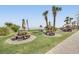 Picturesque picnic area with tables and umbrellas near the beach at 205 74Th Ave. N # 1508, Myrtle Beach, SC 29572