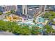 A lazy river winds through the attractions and pool with slides, climbing structures, and lounge chairs at 205 74Th Ave. N # 1508, Myrtle Beach, SC 29572
