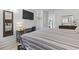 Neat bedroom featuring a desk and doorway to the kitchen, providing space and style at 2300 N Ocean Blvd. # 1037, Myrtle Beach, SC 29577