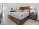 Comfortable main bedroom featuring a large bed, dresser, and serene decor at 2300 N Ocean Blvd. # 1037, Myrtle Beach, SC 29577