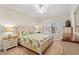 The bedroom features a bright window, ceiling fan and matching bedside tables and dresser at 2350 Clandon Dr., Myrtle Beach, SC 29579