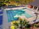 Community pool with multiple lounge chairs, clear blue water, and an adjacent covered picnic area at 2350 Clandon Dr., Myrtle Beach, SC 29579