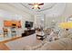 Open-concept living room with bar seating overlooking the kitchen and dining area at 2350 Clandon Dr., Myrtle Beach, SC 29579