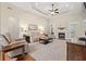 Bright living room boasts a fireplace, a ceiling fan and a comfortable seating area at 2350 Clandon Dr., Myrtle Beach, SC 29579