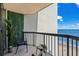Enjoy ocean views from this cozy balcony featuring elegant plants and comfortable seating at 2401 S Ocean Blvd. # 1260, Myrtle Beach, SC 29577