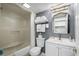 Cozy bathroom featuring a shower and tub combination, toilet, sink, and mirror at 2401 S Ocean Blvd. # 1260, Myrtle Beach, SC 29577