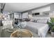 Bright bedroom with a large bed and relaxing sitting area at 2401 S Ocean Blvd. # 1260, Myrtle Beach, SC 29577
