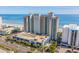 An oceanfront resort featuring striking architecture, a convenient parking garage, and lush landscaping at 2401 S Ocean Blvd. # 1260, Myrtle Beach, SC 29577