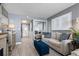 Stylish living room with a comfortable sofa and decorative touches, leading to bedroom at 2401 S Ocean Blvd. # 1260, Myrtle Beach, SC 29577