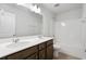 Bathroom featuring dual sinks, a neutral color palette and a shower-tub combo at 2416 Campton Loop, Conway, SC 29527
