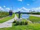 Spring Oaks new home community sign with beautiful blue skies in the background at 2416 Campton Loop, Conway, SC 29527