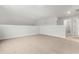 Upper bonus room with wall-mounted outlet and carpet flooring at 2420 Campton Loop, Conway, SC 29527