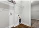 Laundry room with wood-look floors and hookups for the washer and dryer at 2420 Campton Loop, Conway, SC 29527