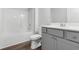 Bathroom featuring tub, shower, toilet, and grey vanity at 2424 Campton Loop, Conway, SC 29527